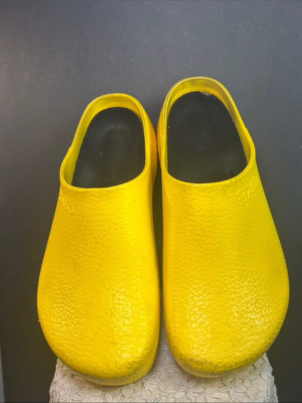 Birki’s Yellow Slip-On Clogs with Black Footbed Birkinstock